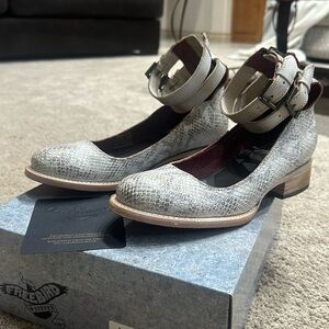 Maribel size 8 in snake skin. Never been worn brand new in box.